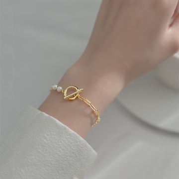 Pulsera de perlas a medio lado - Pulsera de perlas en partes iguales