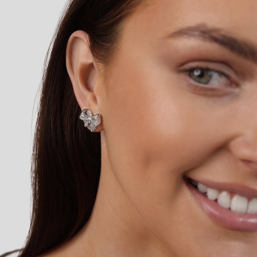 Minerva - pendientes con diseño de lazo en plata esterlina