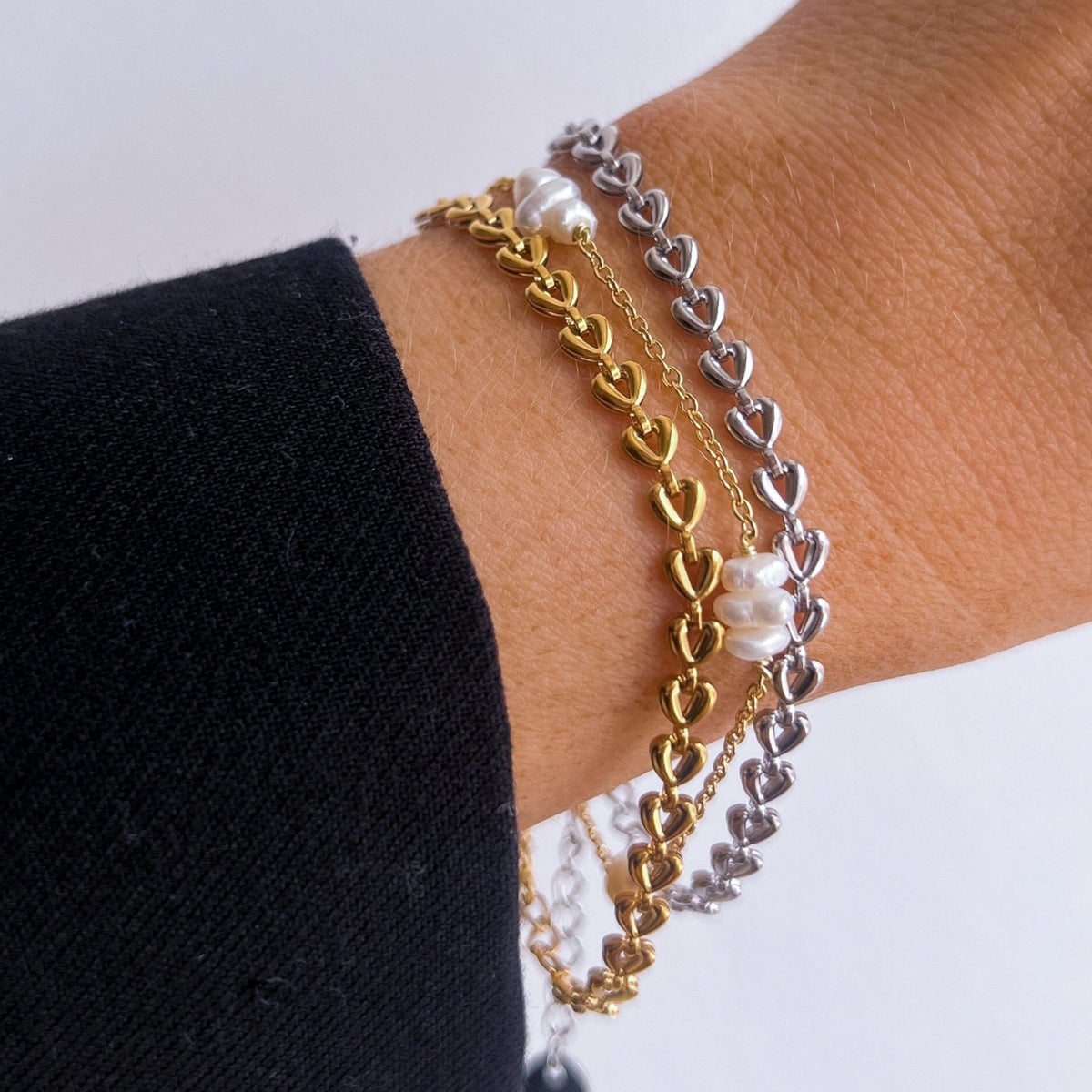 Kendra - Pulsera de cadena con corazón dorado