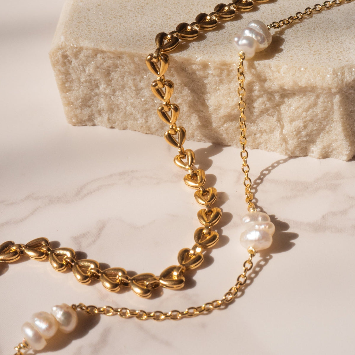 Kendra - Pulsera de cadena con corazón dorado