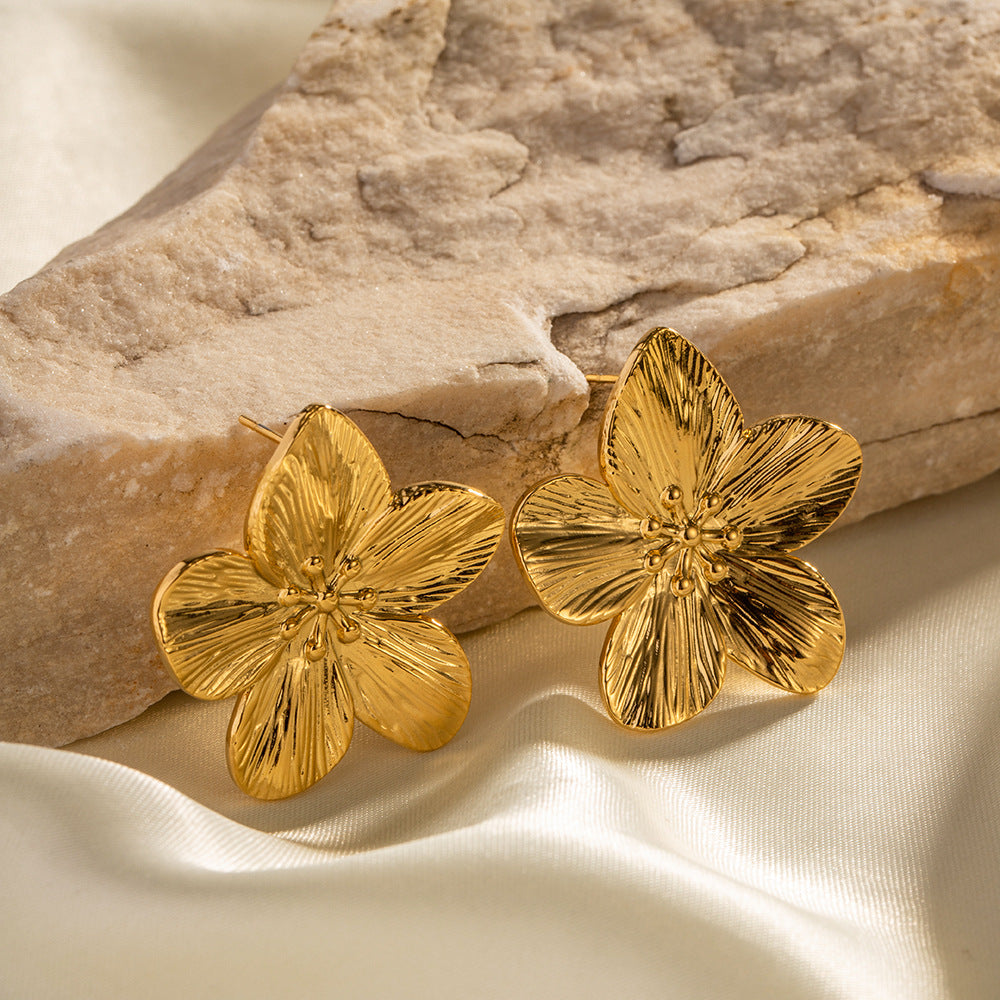 Allysa - Pendientes con diseño floral dorado