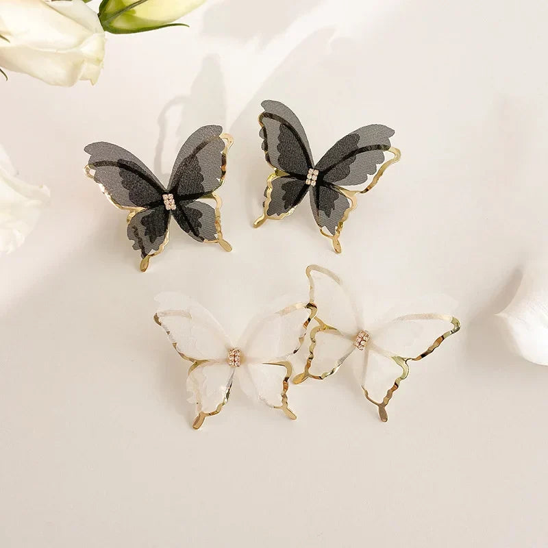 Jean – Pendientes de mariposa de tejido ligero