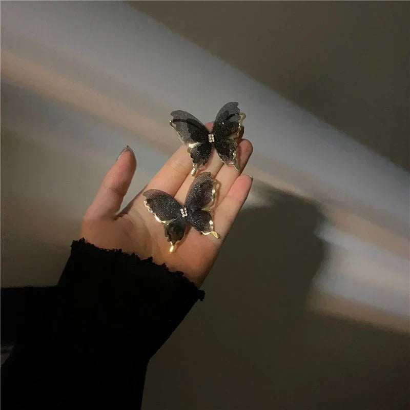 Jean – Pendientes de mariposa de tejido ligero