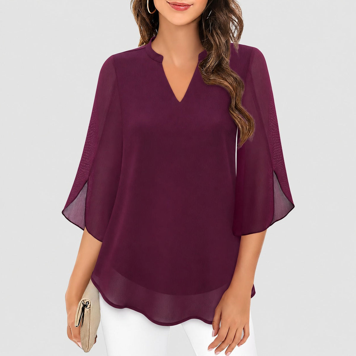 Ella - Blusa aireada con llamativas aberturas en las mangas