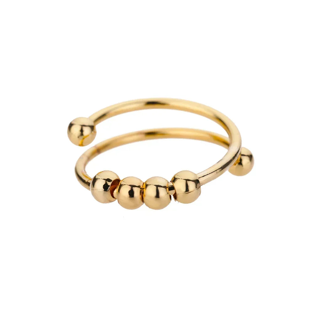 Maelis – Anillo antiestrés con perlas giratorias