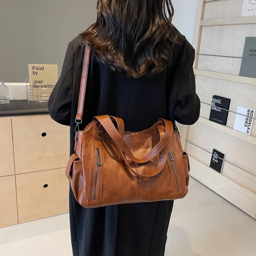 Bolso bandolera para mujer con múltiples compartimentos y diseño versátil