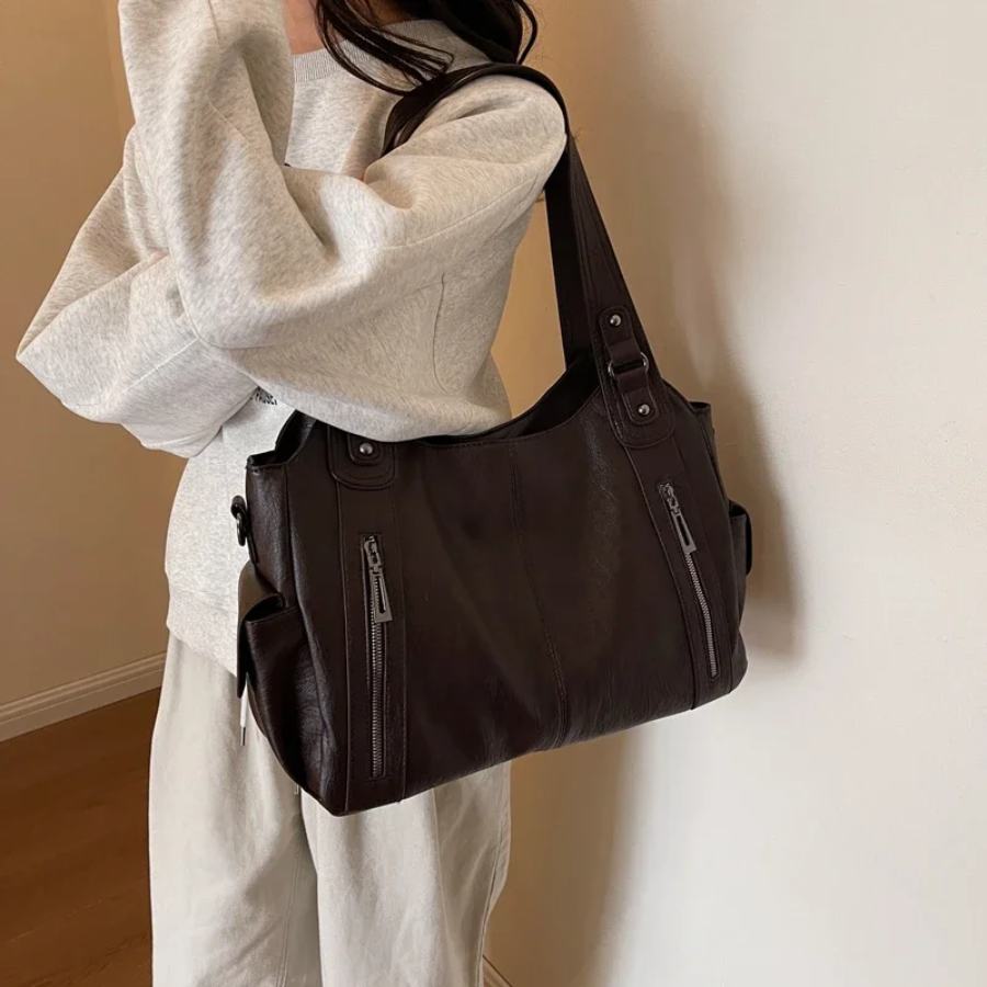 Bolso bandolera para mujer con múltiples compartimentos y diseño versátil