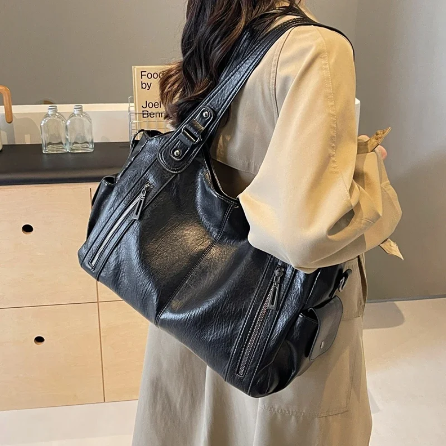 Bolso bandolera para mujer con múltiples compartimentos y diseño versátil