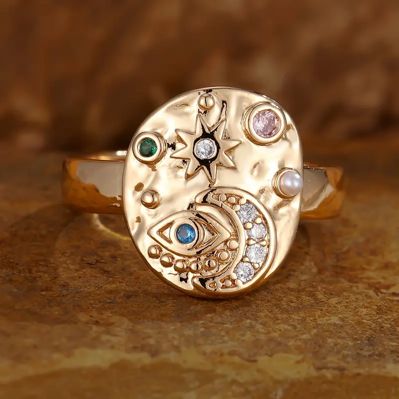 Solenya – Anillo de cristal dorado con diseño sol-luna
