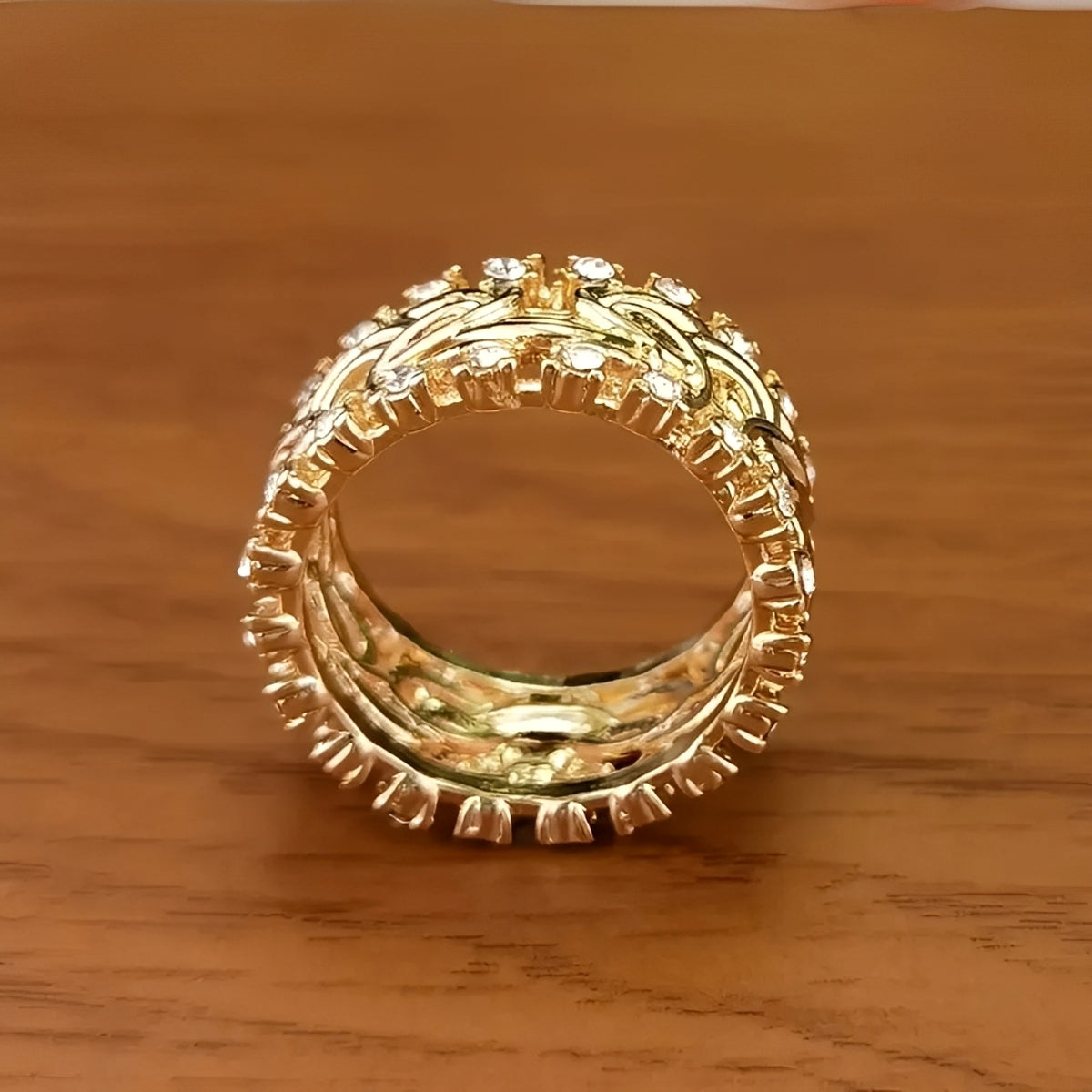 Lydia – Joya trenzada en oro con circonitas
