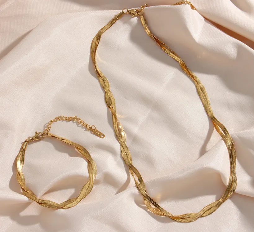 Alina – Set de collar y pulsera elegante dorado entrelazado