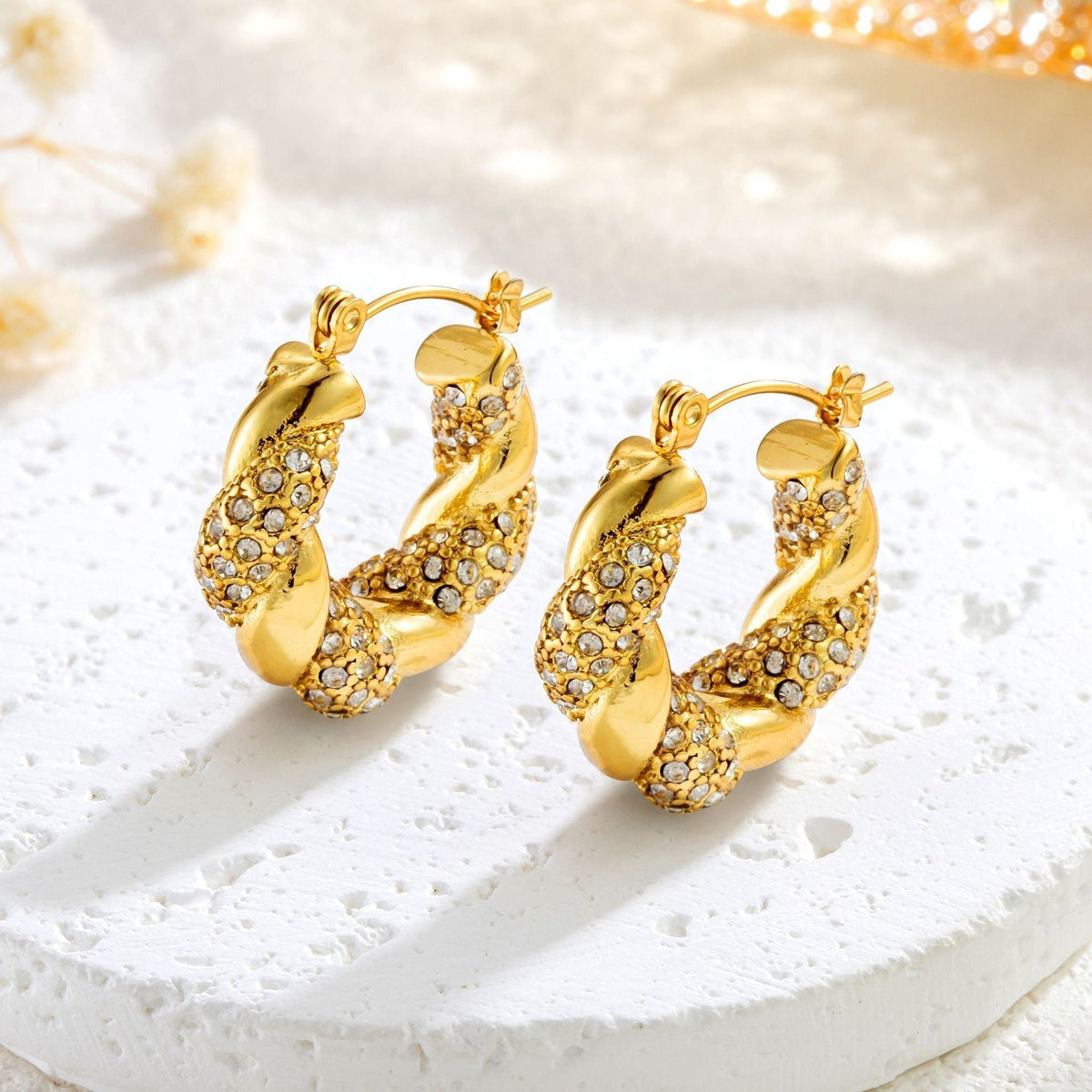 Alix – Pendientes U-Twist en dorado