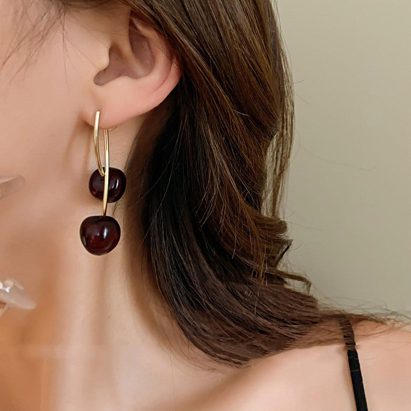 Cheri – Pendientes dorados colgantes de cereza
