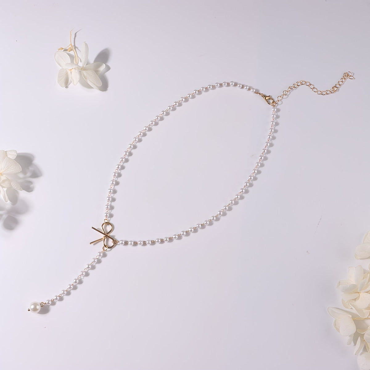 Antoneth – Collar con colgante de lazo con perla