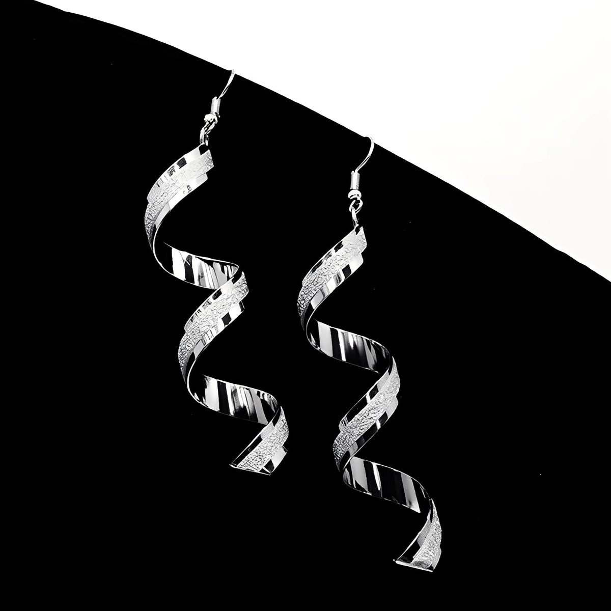 Jia – Pendientes espirales de plata deslumbrantes