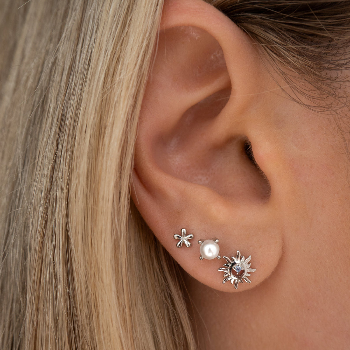 Pendientes mini de flores en plata esterlina