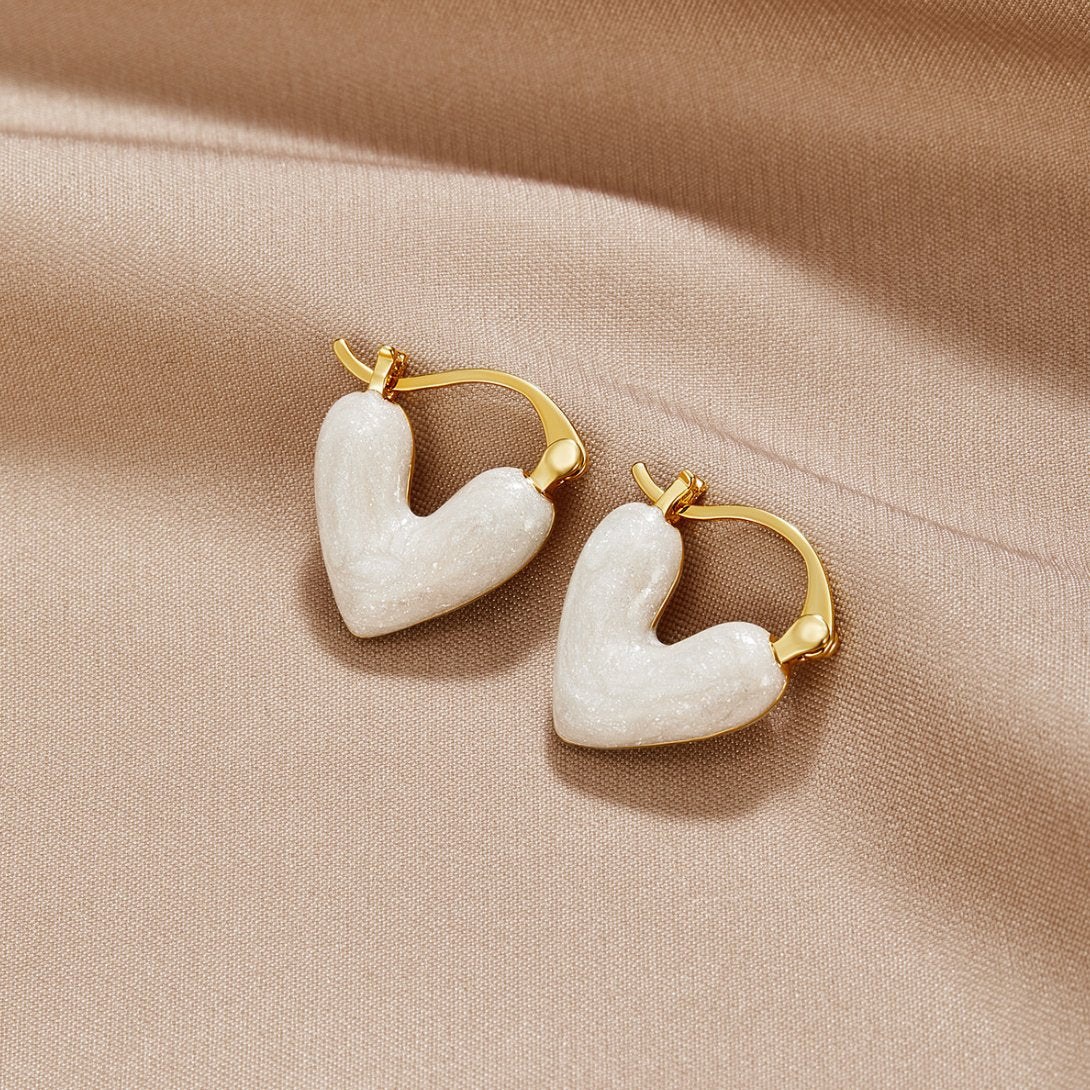 Aya – Pendientes de corazón dorado