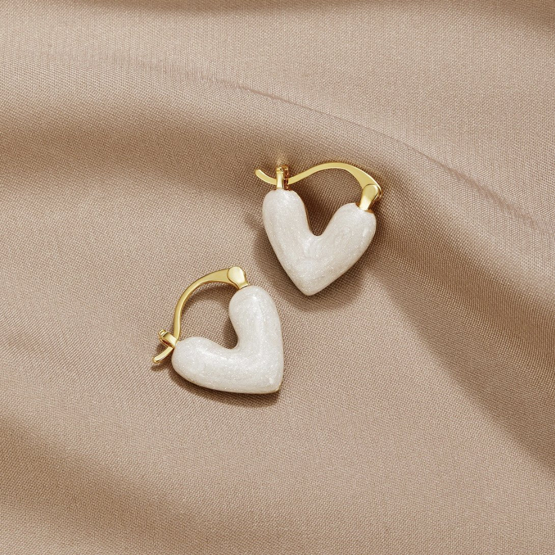 Aya – Pendientes de corazón dorado